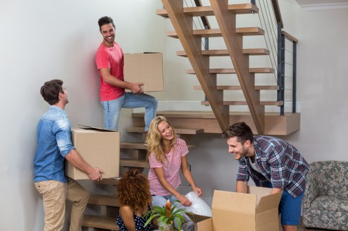 Removal team planning a move on a Dalston street