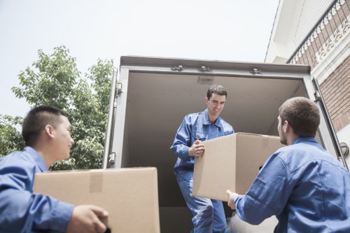 Local moving help on a Dalston street with flats and parking access