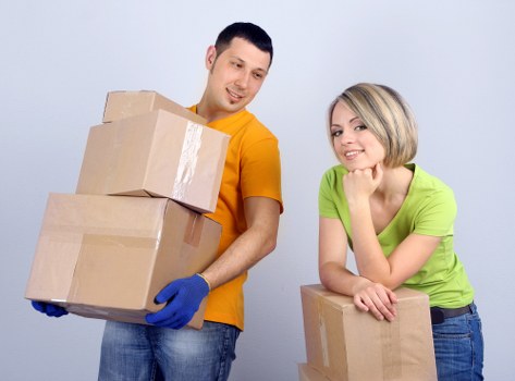 Packed moving boxes ready for a home relocation in Dalston