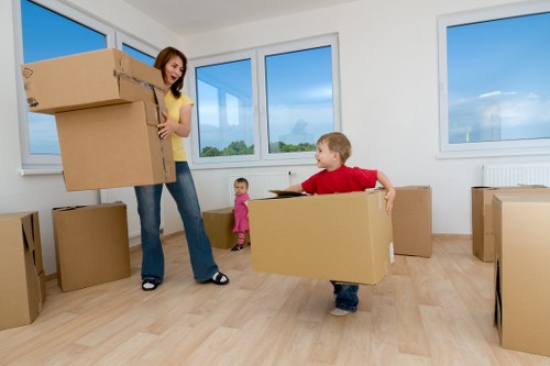 Household furniture and boxes arranged for unloading at a new Dalston home