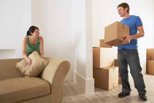 Professional movers handling packing and careful loading for a Dalston relocation